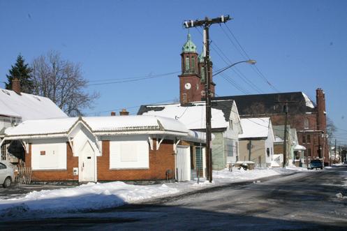 Paderewski Drive @ Sears Street. Corpus Christi Church, a National Historic Landmark, in background.